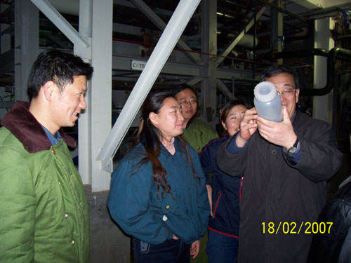 Chief Engineer, Mr. Piao, celebrating the first batch of nickel powder produced at the CVMR plant in Jilin